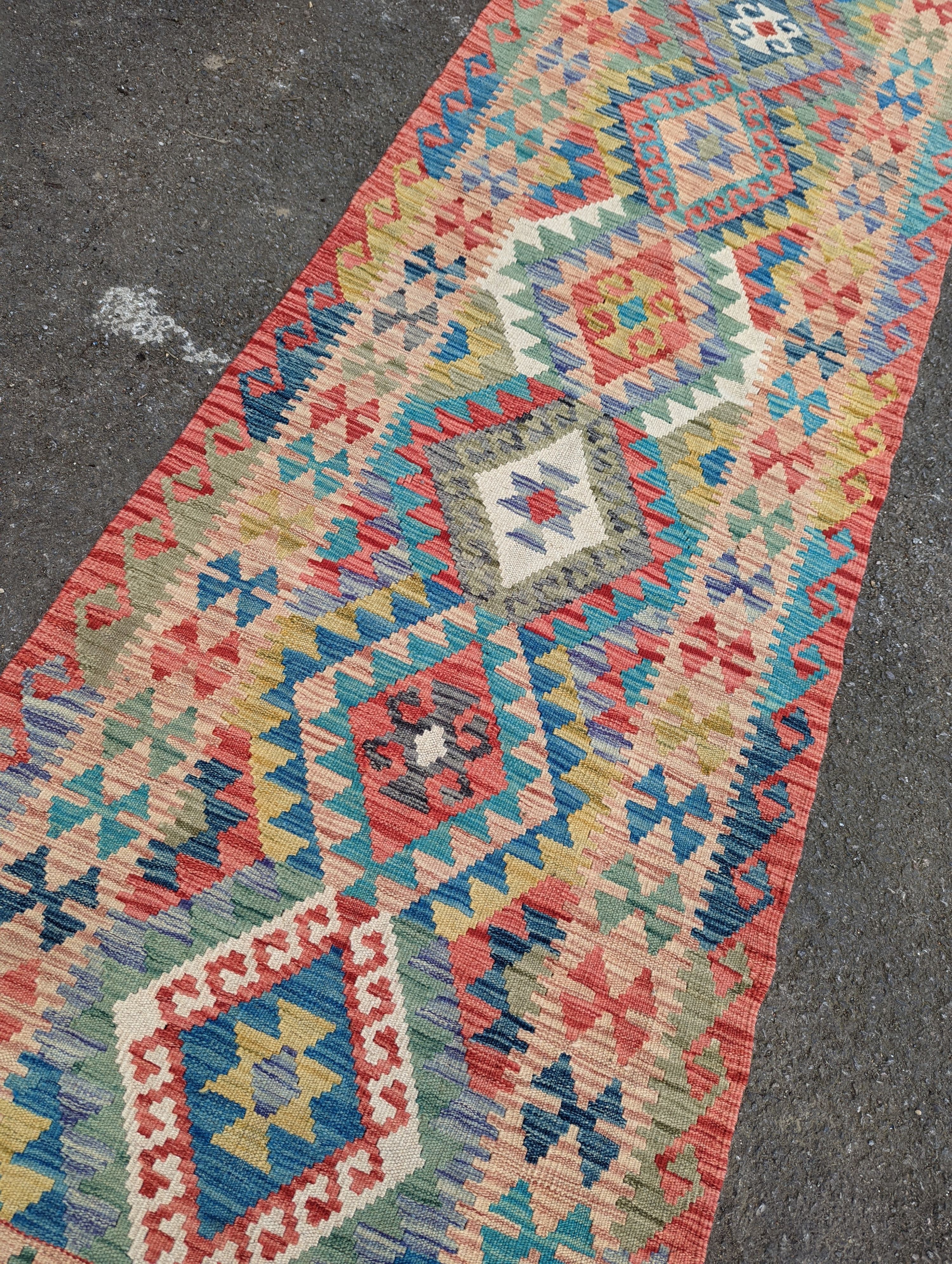 A contemporary Anatolian design Kilim flatweave runner, 290 x 85cm